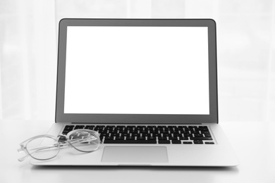 Image of Modern computer with blank screen on white background. Space for design