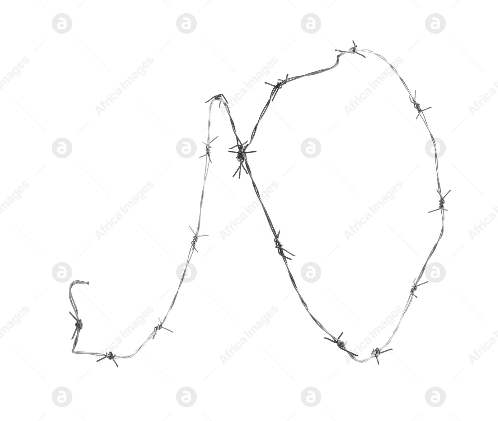 Photo of Shiny metal barbed wire isolated on white