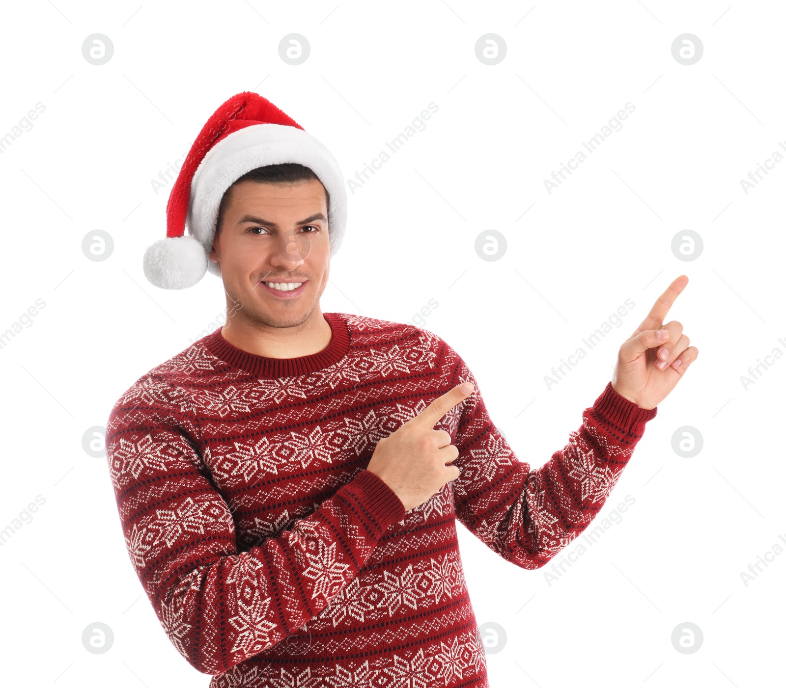 Photo of Handsome man wearing Santa hat on white background