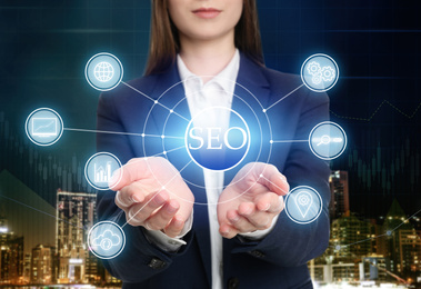 Image of Woman demonstrating directions of SEO, closeup. Icons of keyword research, customization and others