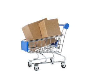 Photo of Shopping cart with boxes isolated on white. Logistics and wholesale concept