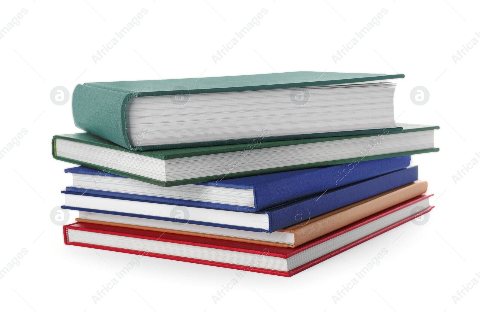 Photo of Many different books stacked on white background