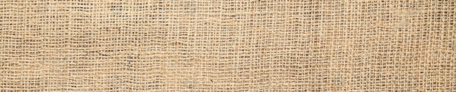 Image of Texture of natural burlap fabric as background, top view. Banner design