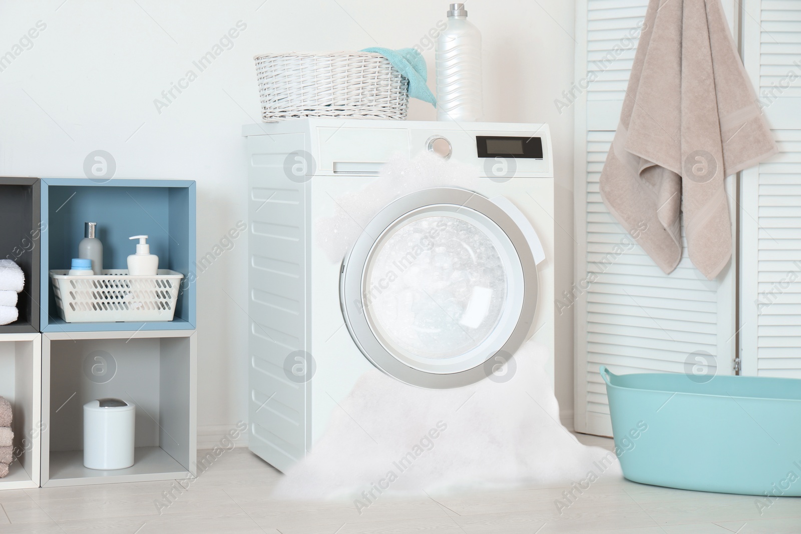 Image of Foam coming out from broken washing machine during laundering in room