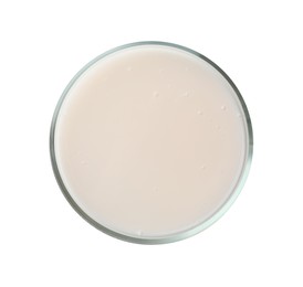 Photo of Petri dish with colorful liquid sample on white background, top view