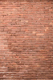 Texture of old red brick wall as background