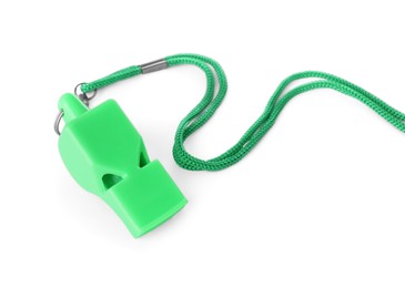 Photo of One green plastic whistle with cord isolated on white