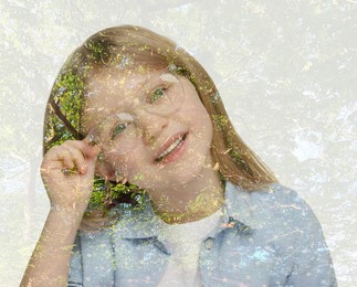 Double exposure of cute little girl and green tree