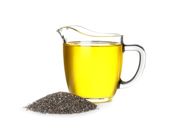 Photo of Jug with chia oil and pile of seeds on white background