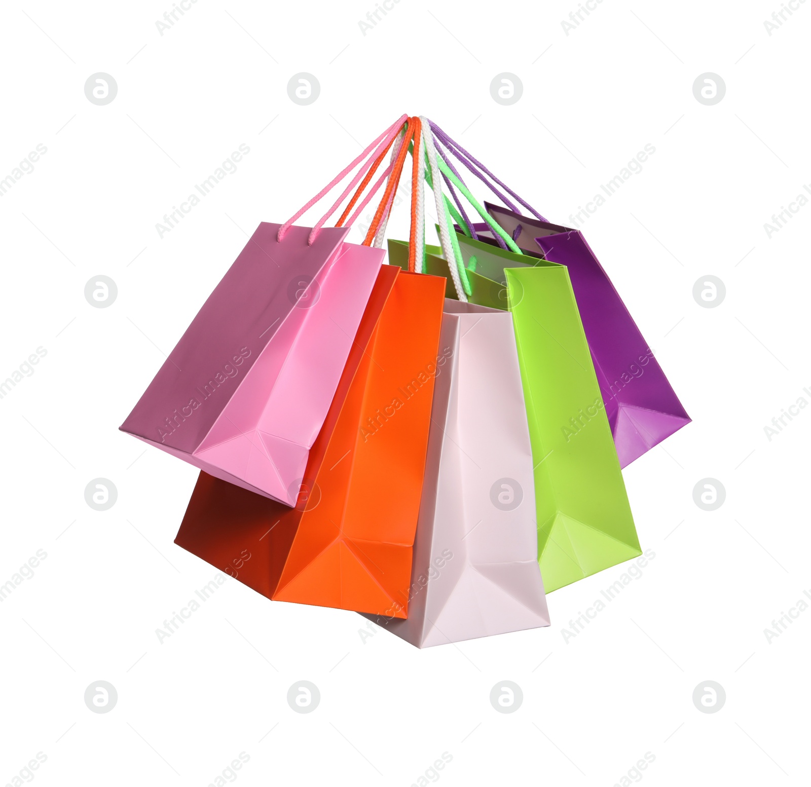 Photo of Colorful paper shopping bags isolated on white