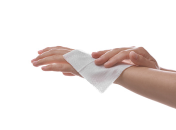 Photo of Woman cleaning wrist with wet wipe on white background, closeup