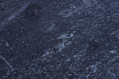 Photo of Macro photo of black marble surface as background, top view