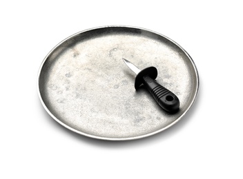 Stainless steel oyster knife with plastic handle on metal tray against white background