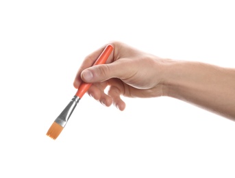 Man holding paint brush on white background, closeup