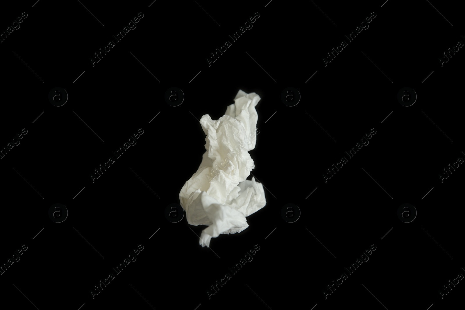 Photo of Used paper tissue on black background, top view