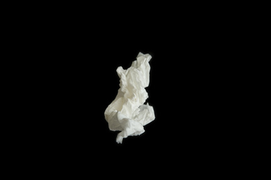 Photo of Used paper tissue on black background, top view