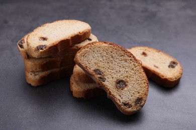 Photo of Sweet hard chuck crackers with raisins on grey table