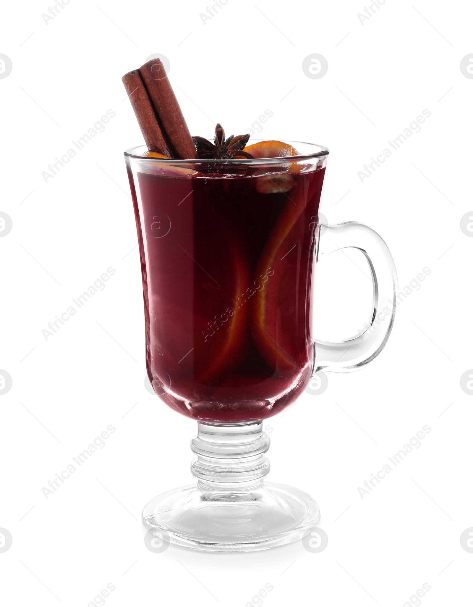 Photo of Aromatic mulled wine in glass cup isolated on white