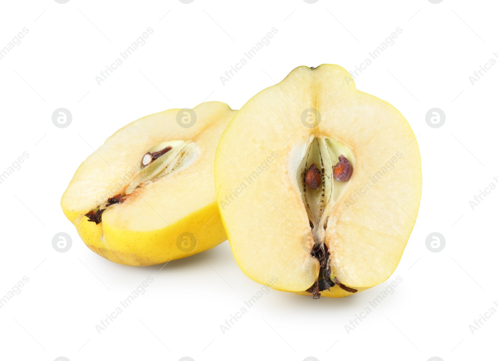 Photo of Halves of fresh ripe quince isolated on white