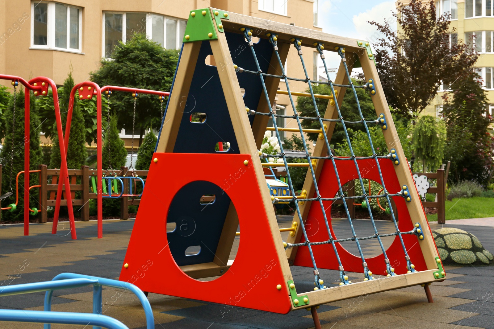 Photo of Empty outdoor children's playground in residential area