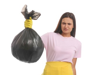 Photo of Woman holding full garbage bag on white background