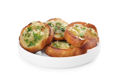 Slices of toasted bread with garlic and herb on white background