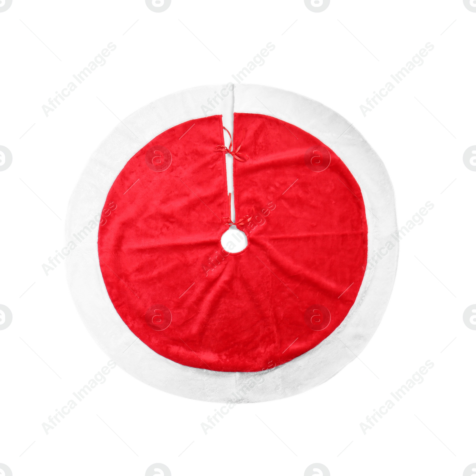 Photo of Red Christmas tree skirt isolated on white, top view