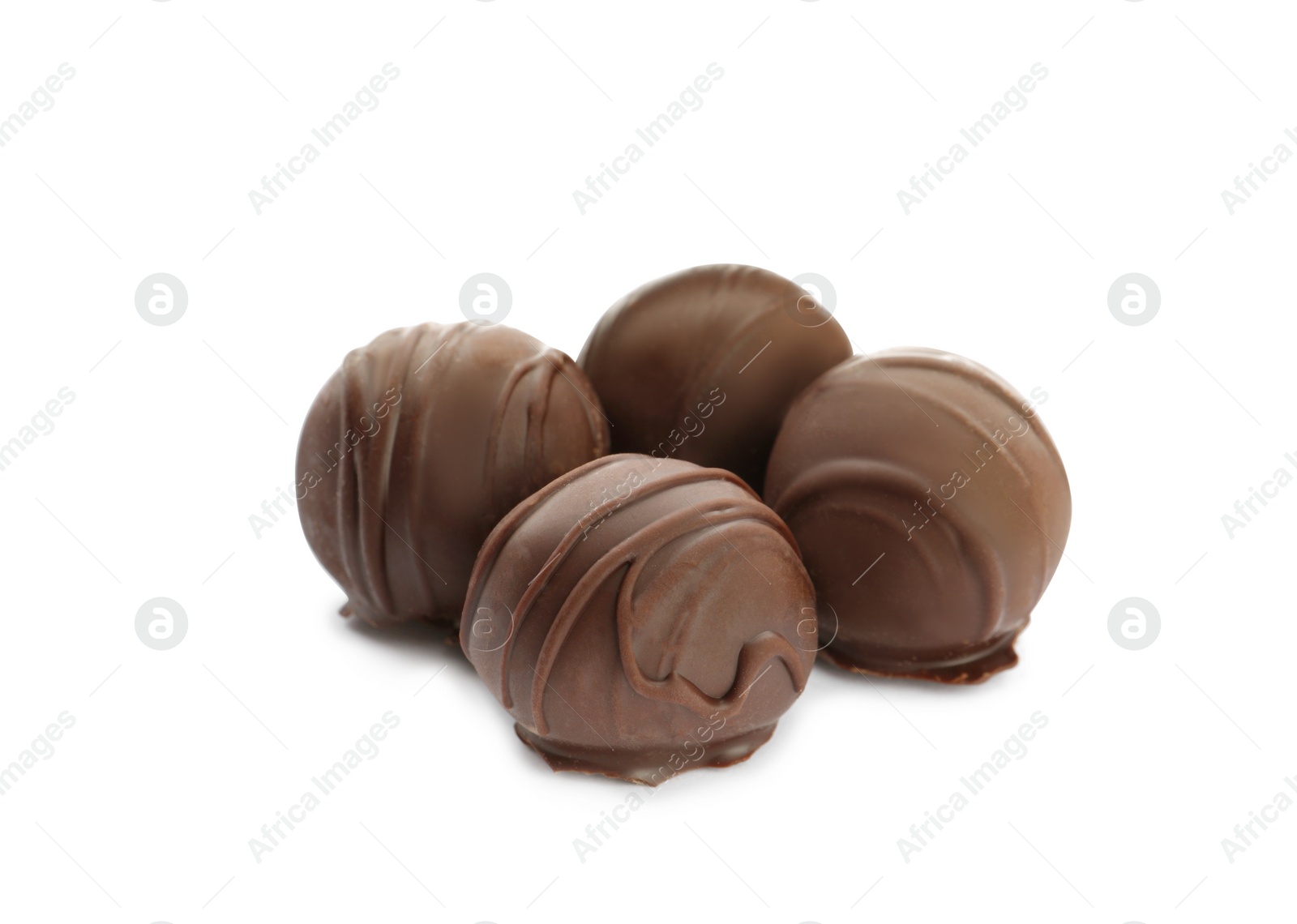 Photo of Delicious sweet chocolate truffles on white background