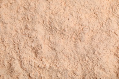 Organic lentil flour as background, closeup view