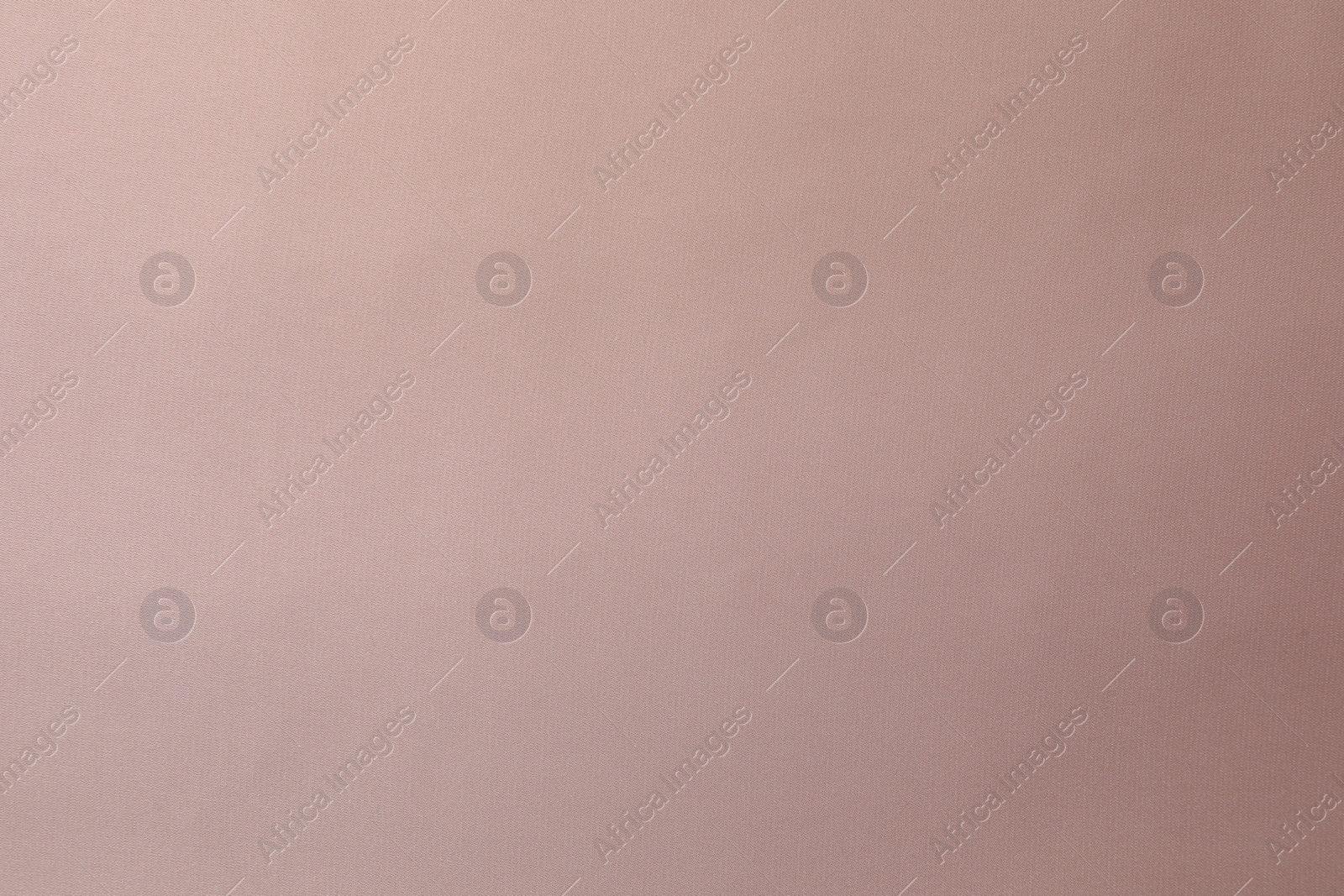Photo of Pink silk fabric as background, top view