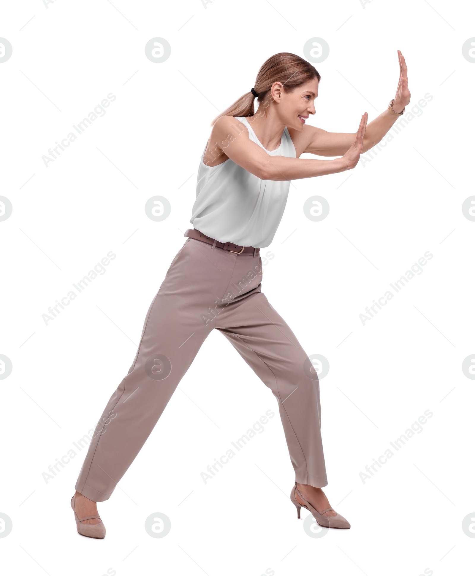 Photo of Beautiful businesswoman avoiding something on white background