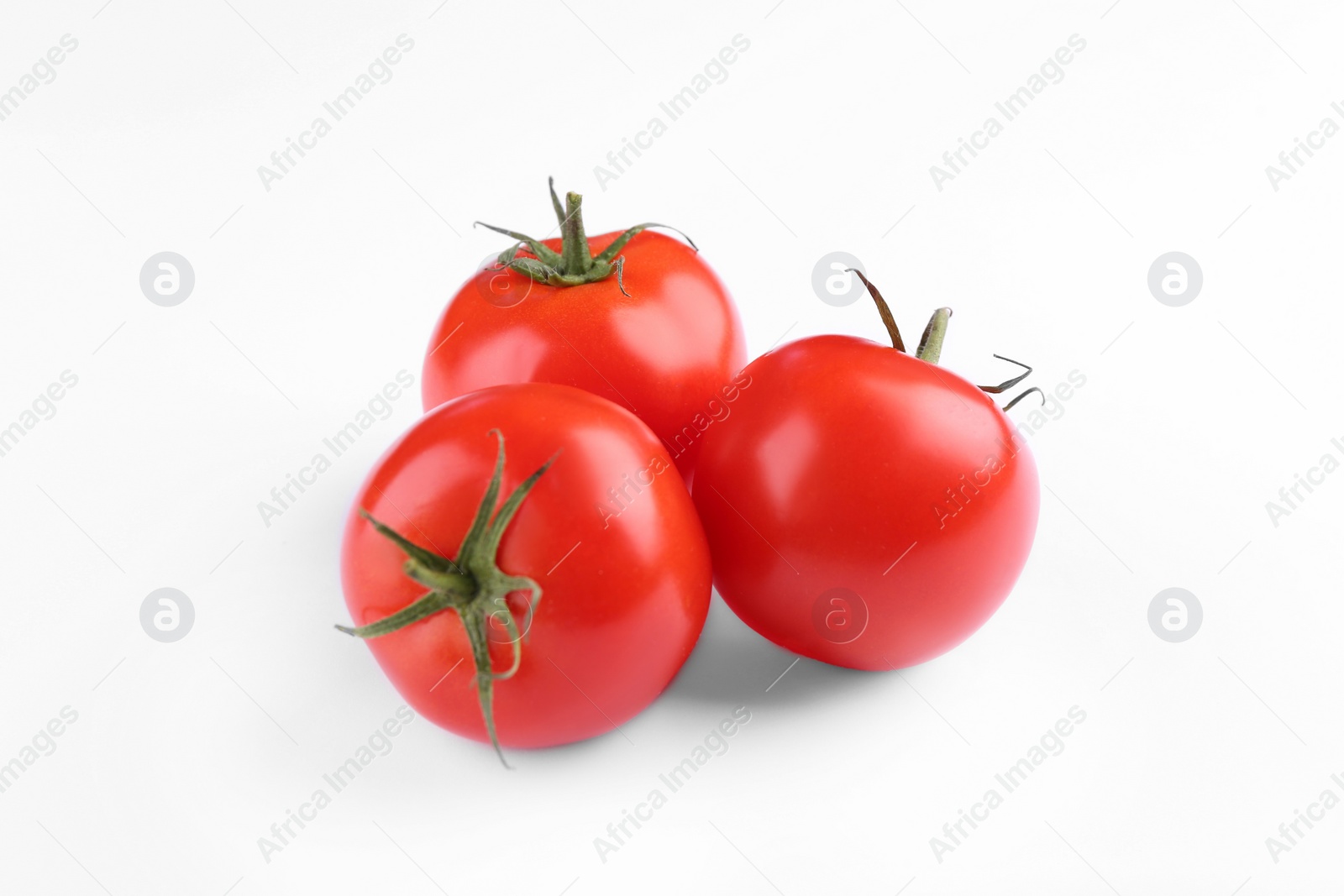 Photo of Fresh ripe red tomatoes on white background