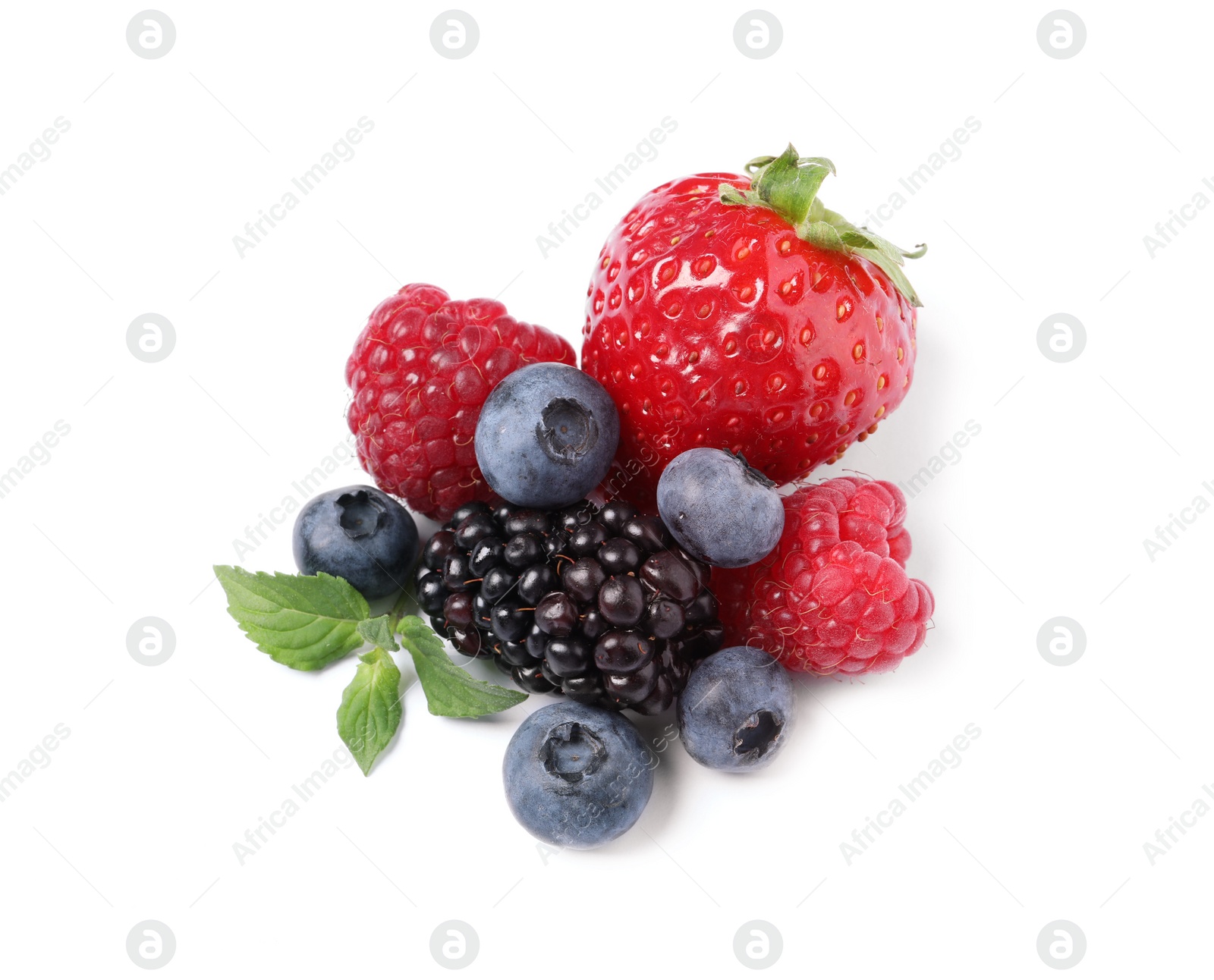 Photo of Many different ripe berries and mint leaves isolated on white