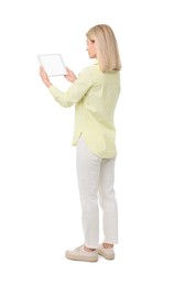 Photo of Woman holding tablet with blank screen on white background