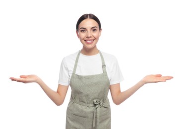 Young woman in light green apron on white background