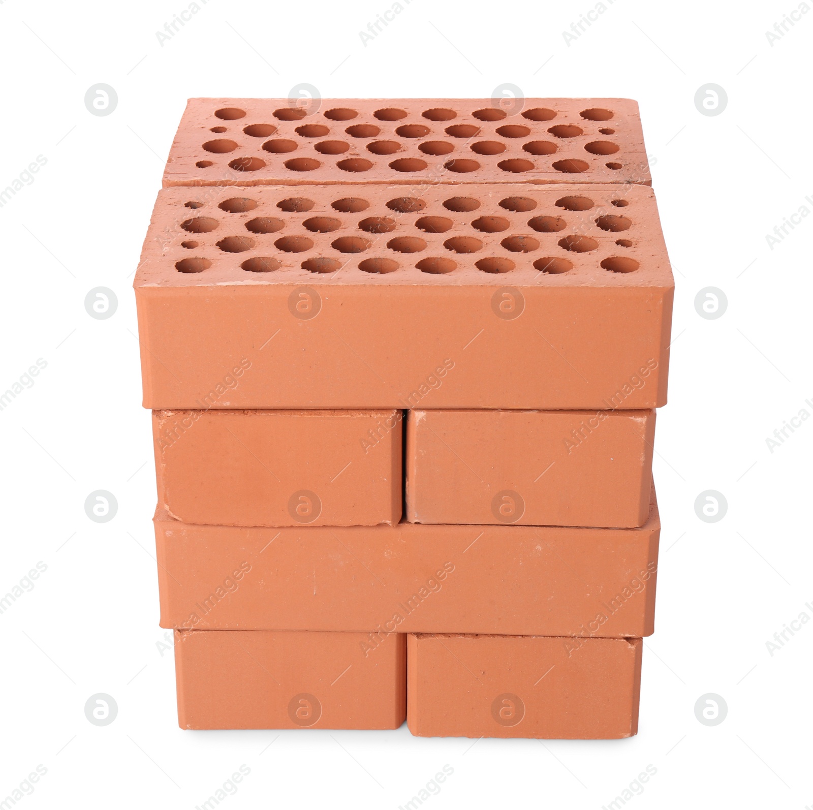 Photo of Many red bricks on white background. Building material