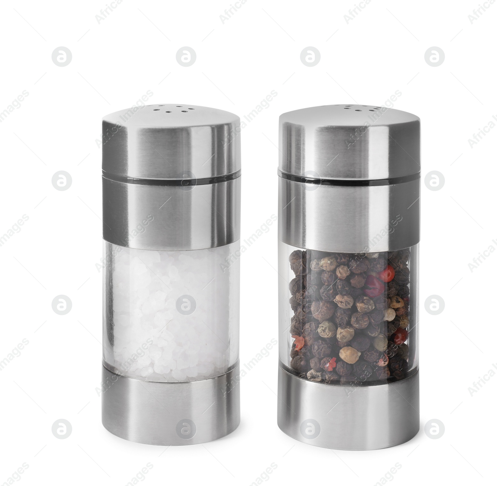 Photo of Pepper and salt in shakers isolated on white