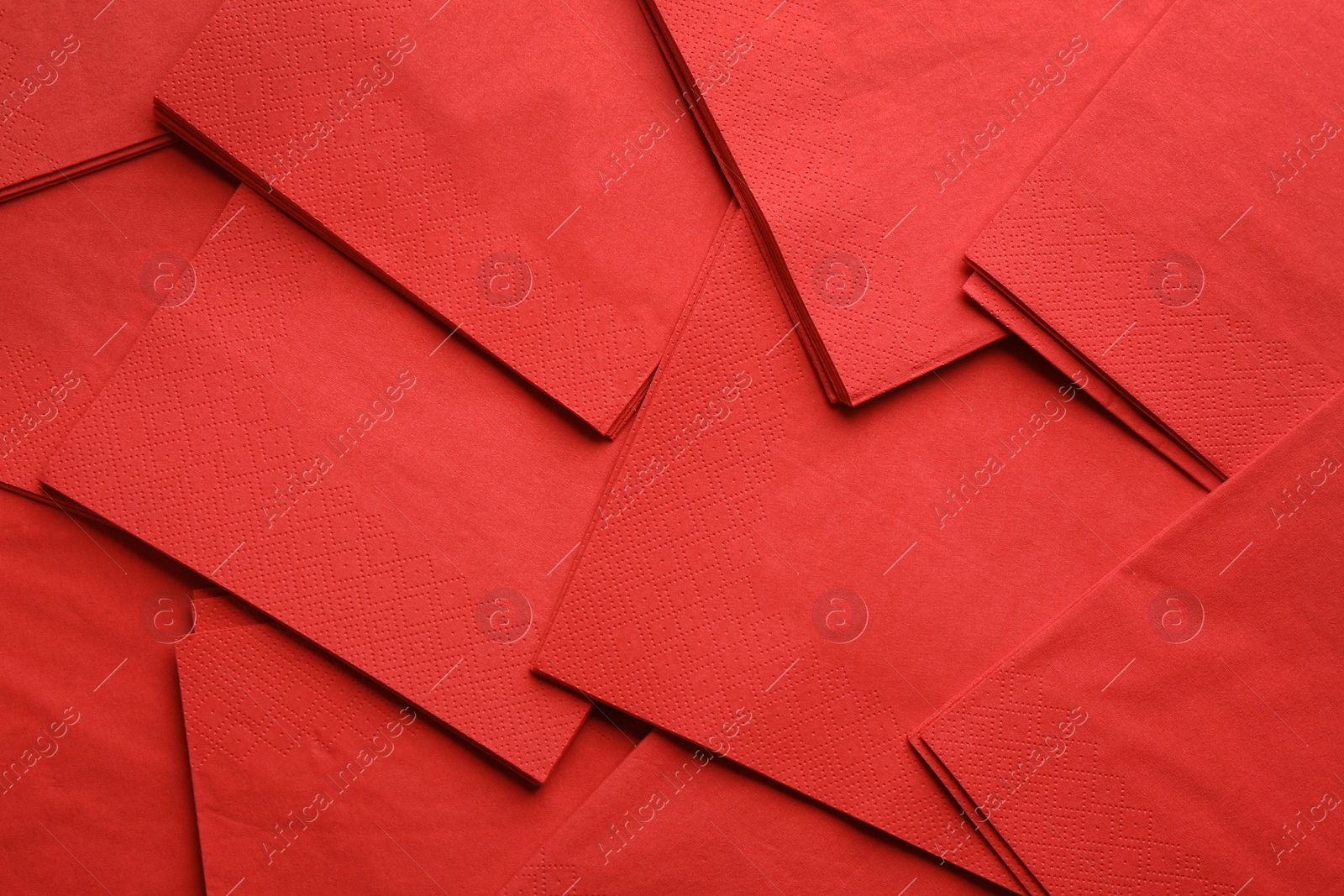 Photo of Clean paper napkins as background, top view. Personal hygiene