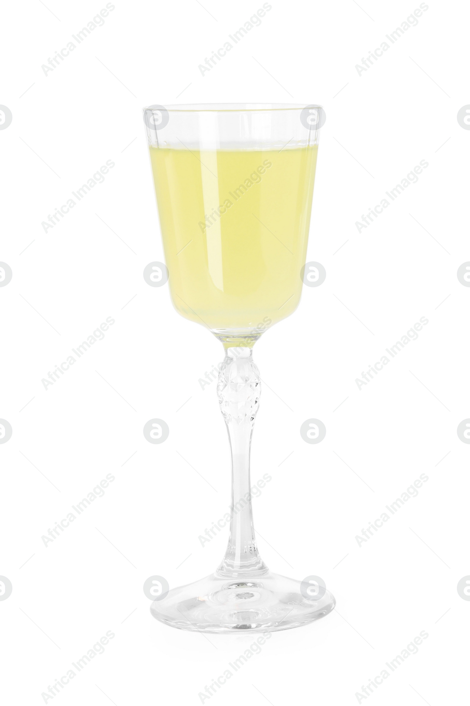 Photo of Liqueur glass with tasty limoncello isolated on white