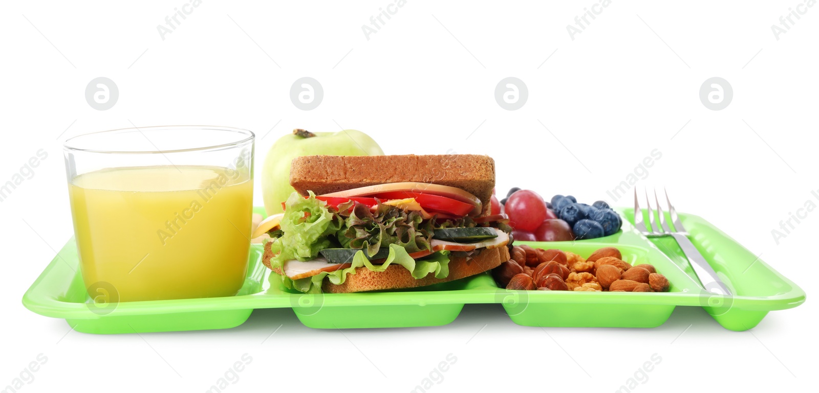 Photo of Tray with tasty food and juice on white background. School lunch