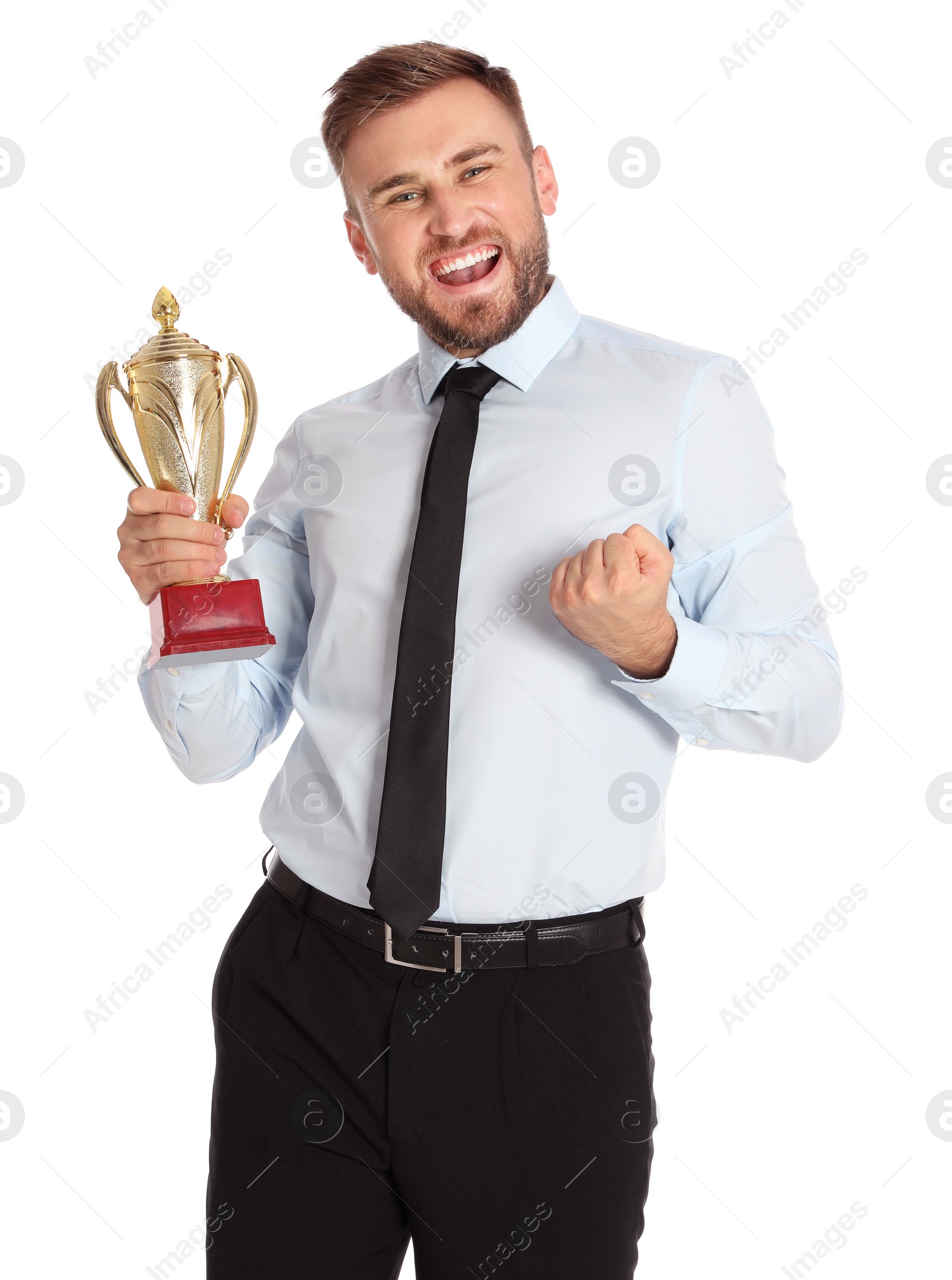 Photo of Portrait of happy young businessman with gold trophy cup on white background