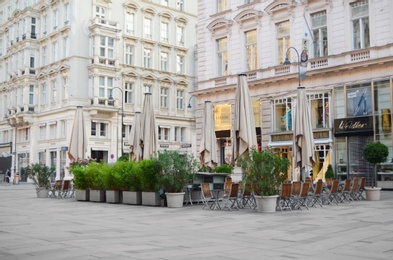 VIENNA, AUSTRIA - JUNE 18, 2018: Open-air cafe on city street