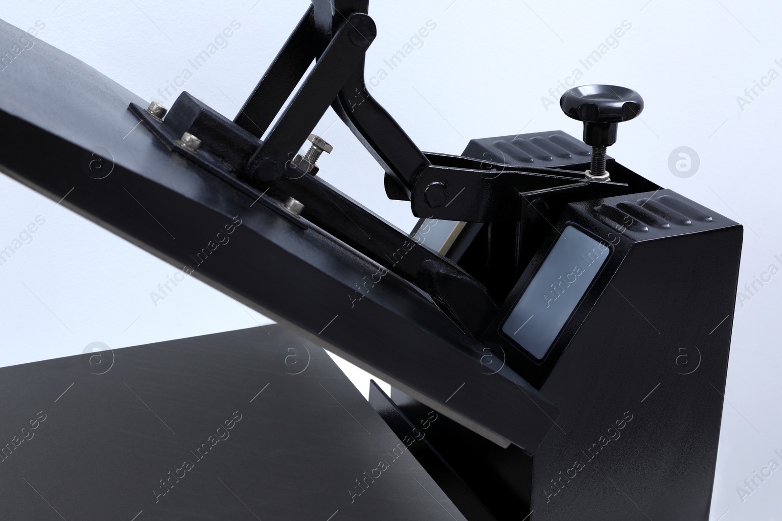 Photo of Heat press machine on light background, closeup view