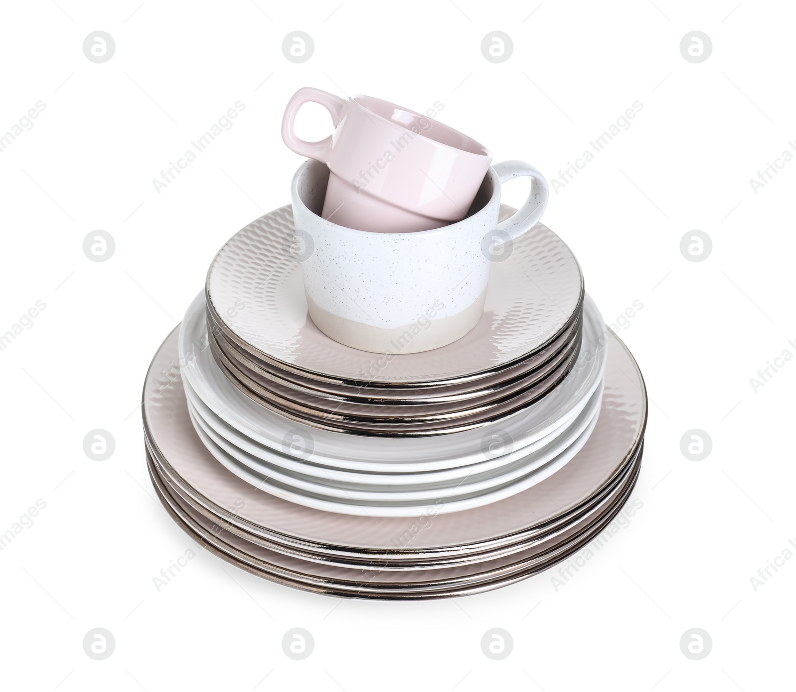 Photo of Beautiful ceramic plates and cups isolated on white