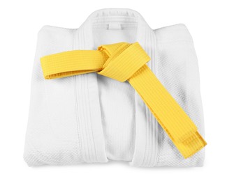 Photo of Yellow karate belt and kimono isolated on white