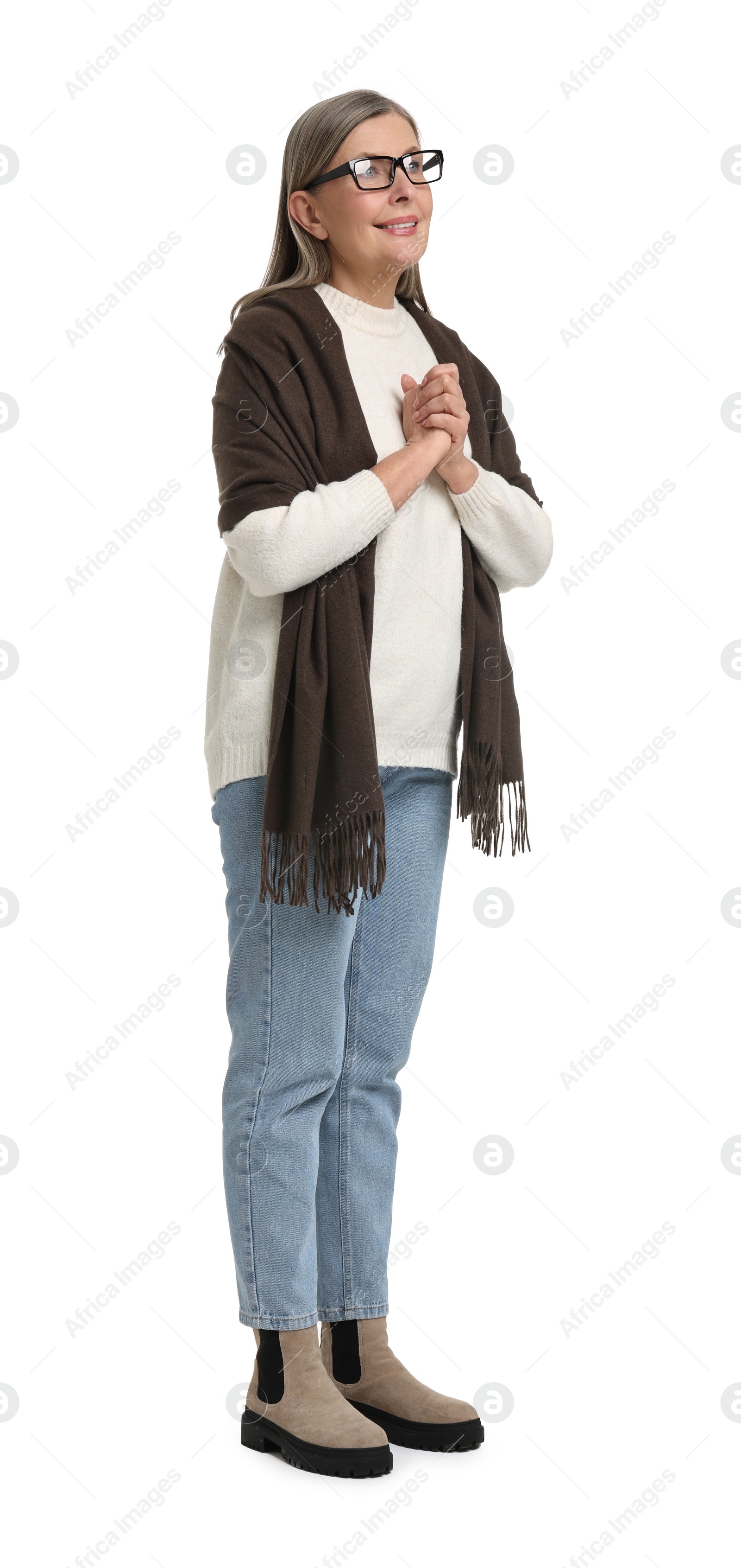 Photo of Full length portrait of senior woman on white background