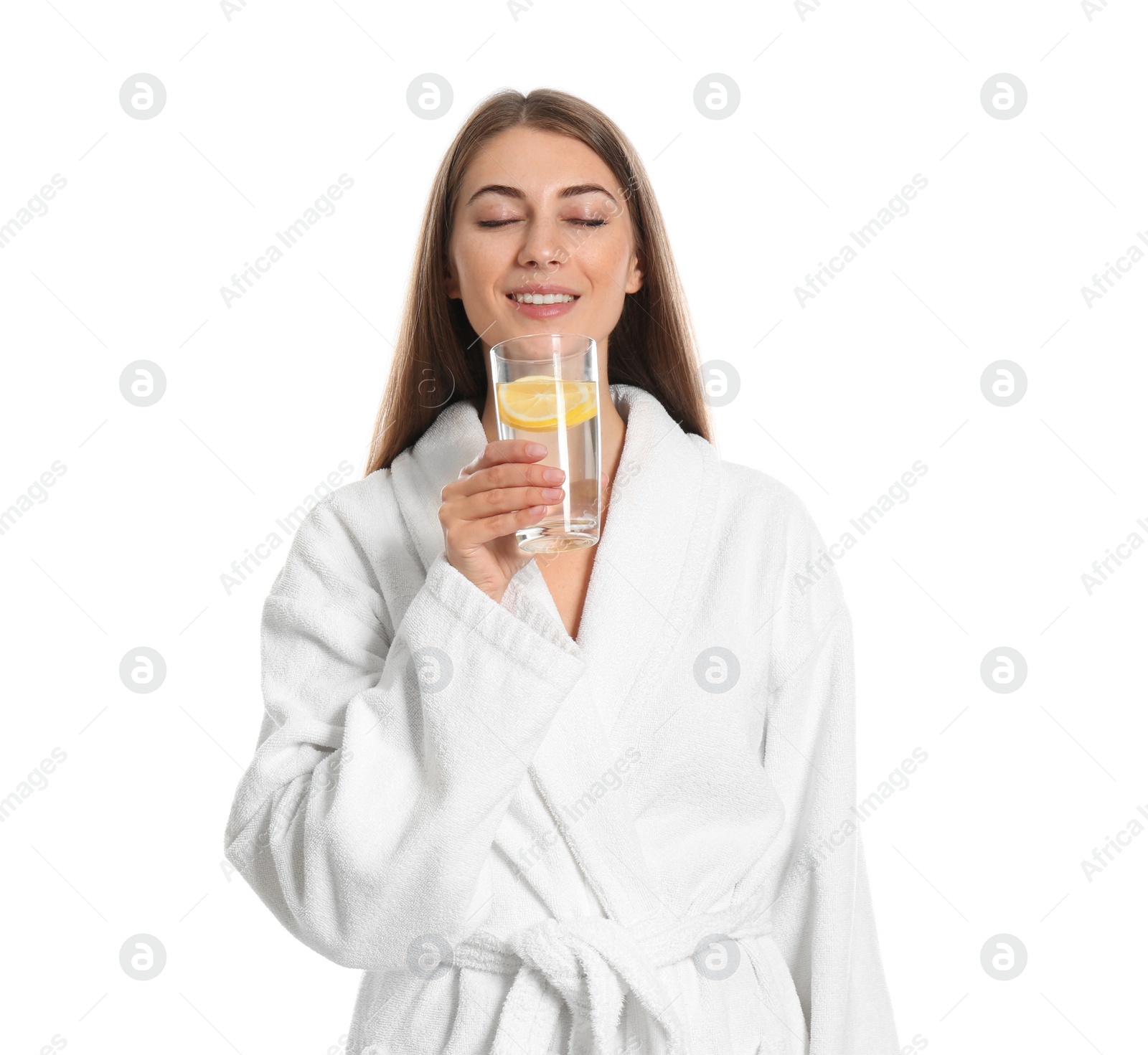 Photo of Young woman with glass of lemon water on white background