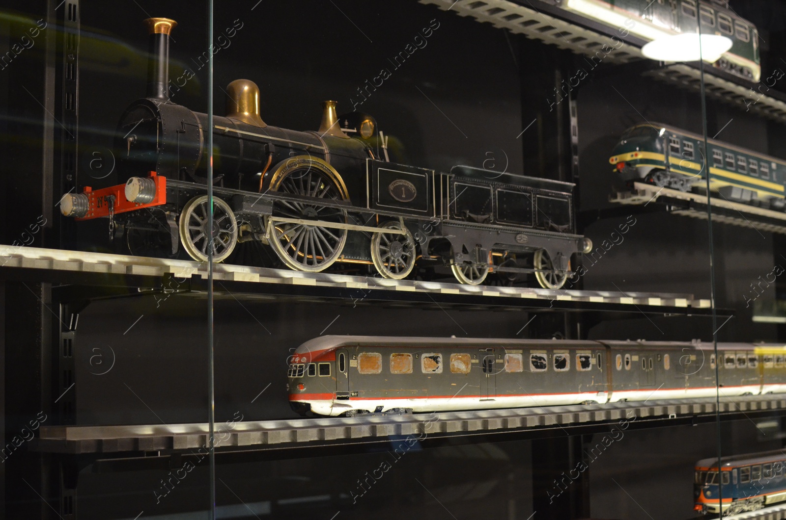 Photo of Utrecht, Netherlands - July 23, 2022: Models of different old trains on display in Spoorwegmuseum