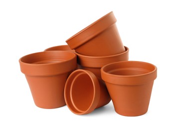 Photo of Empty clay flower pots isolated on white