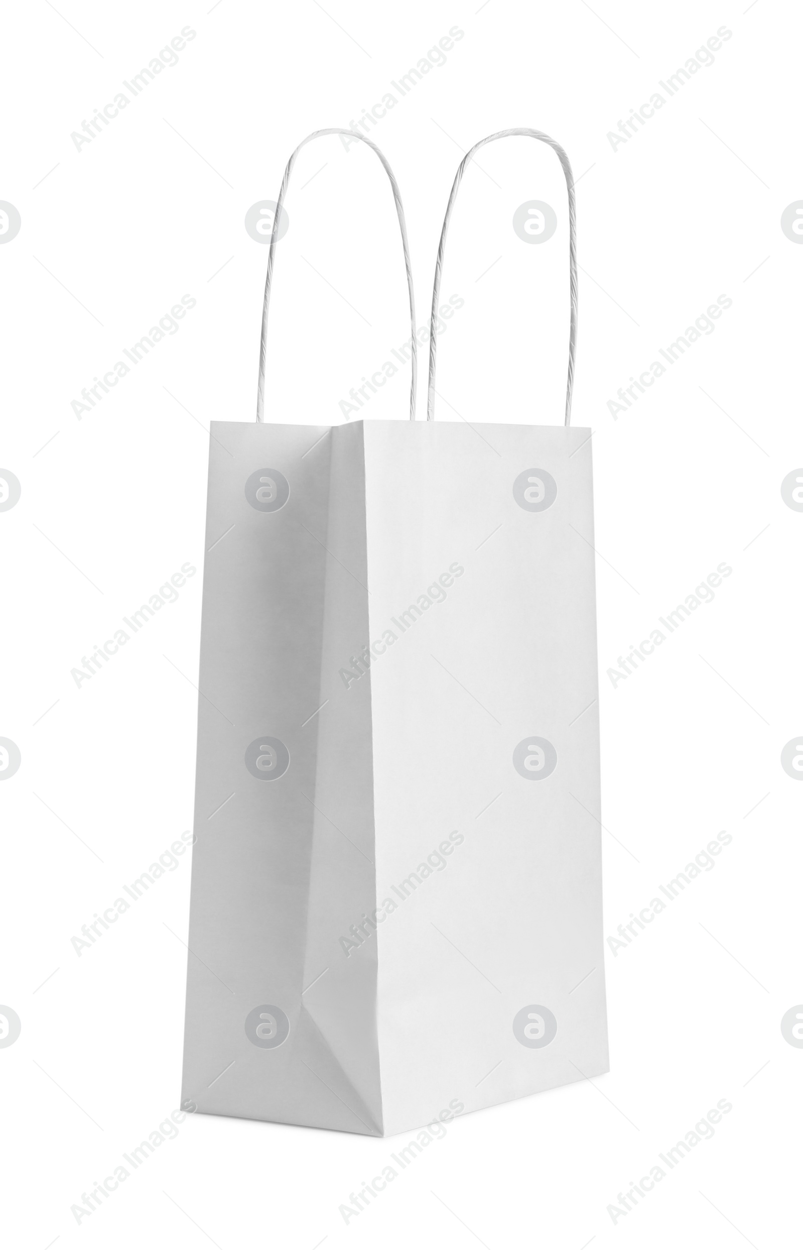 Photo of One paper bag isolated on white. Mockup for design